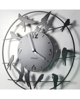 Vista di profilo dell'orologio in metallo uccelli Birdy.