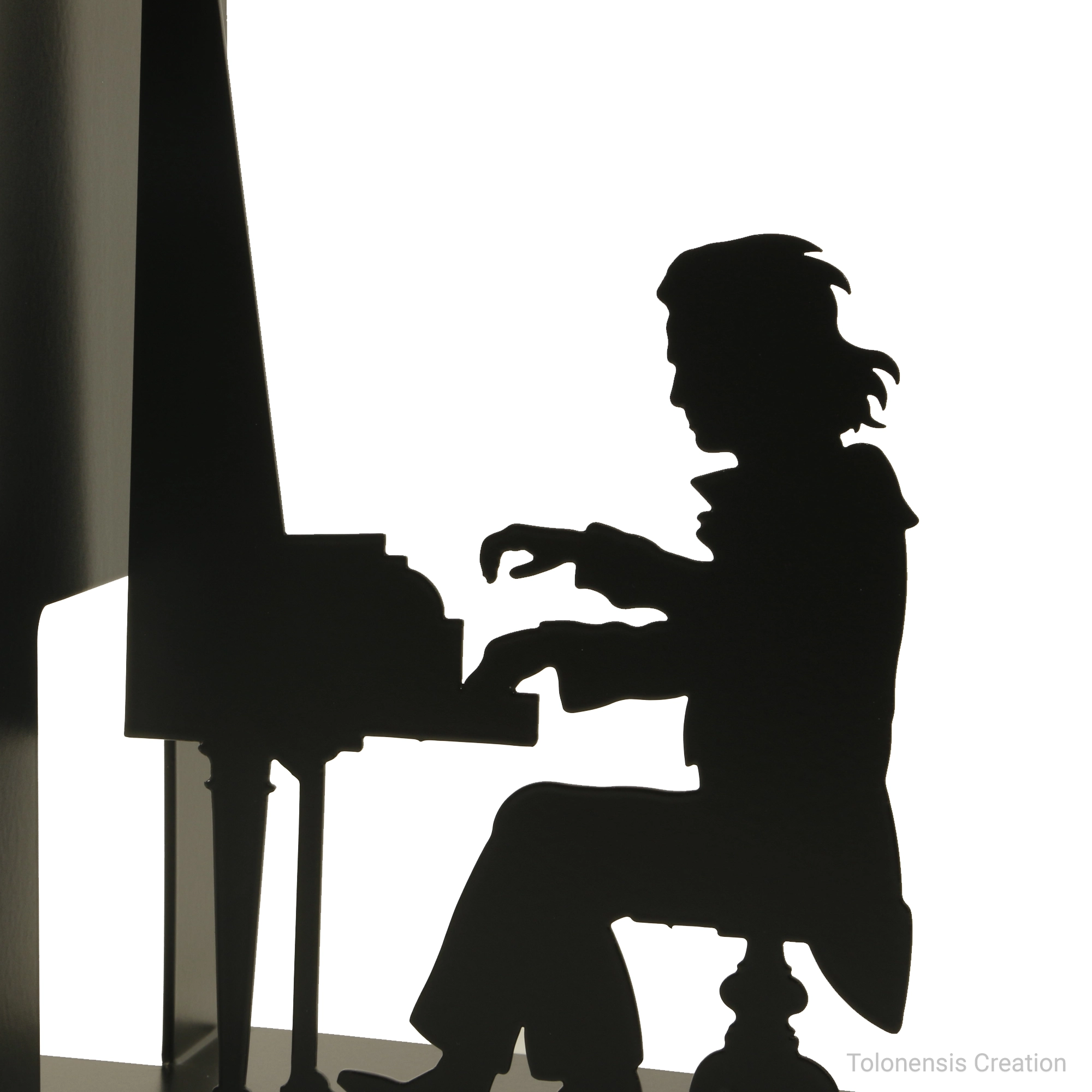 Close-up of the Beethoven bookend showing laser cutting precision and powder-coated finish by Tolonensis Creation