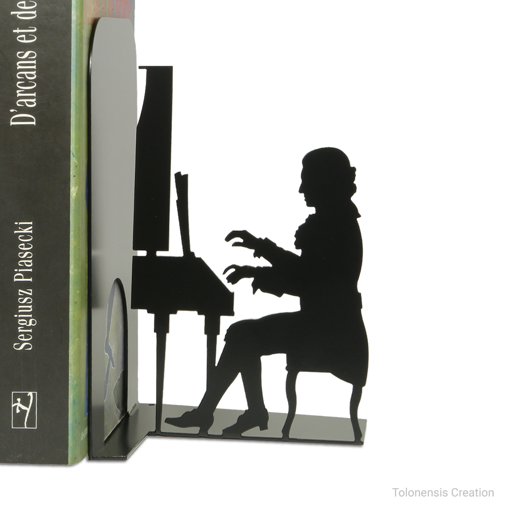 アントン・ヴァルター設計のピアノとモーツァルトを表現したブックエンド。トロネンシス・クリエーションのメタル作品