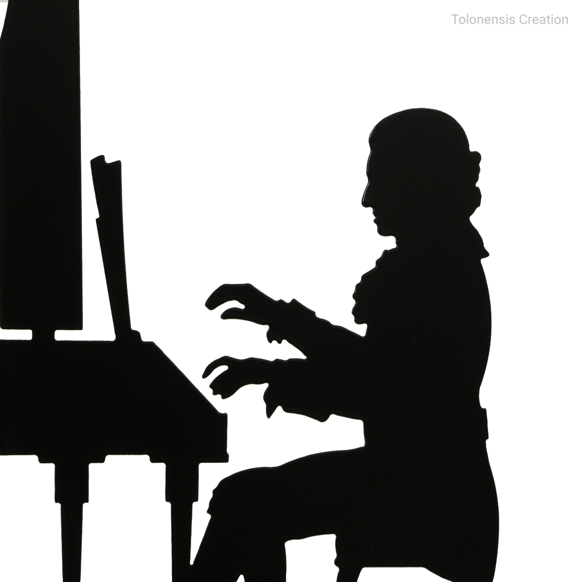 モーツァルトのブックエンドのクローズアップ。レーザーカットの精度と高品質な粉体塗装を示す